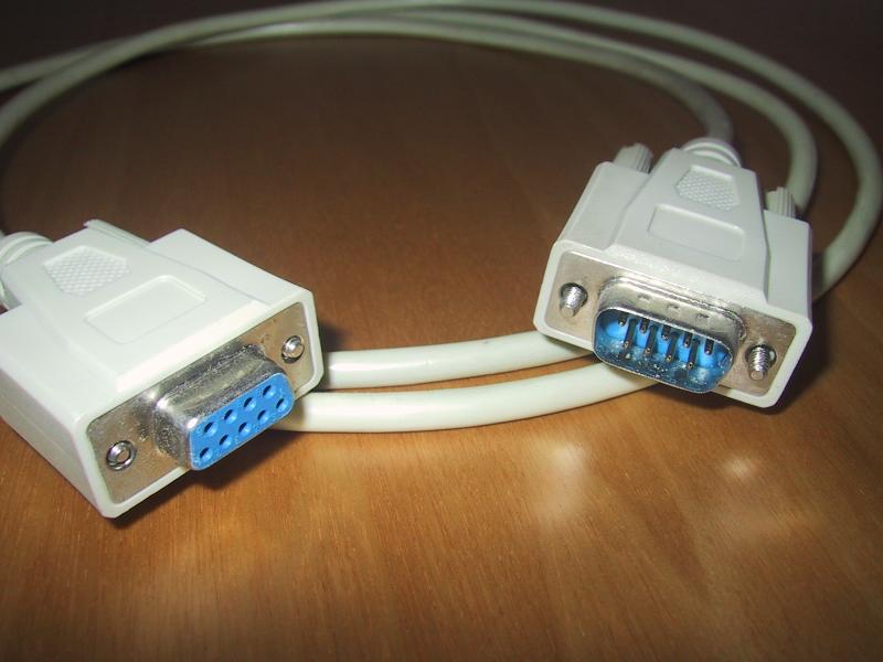 The connectors of a straight serial cable