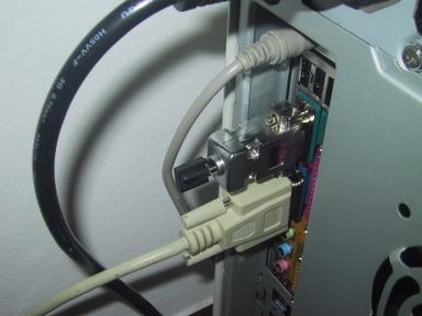 A serial receiver inserter in the serial port on the back of the PC